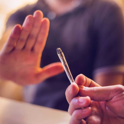 Man refusing a joint